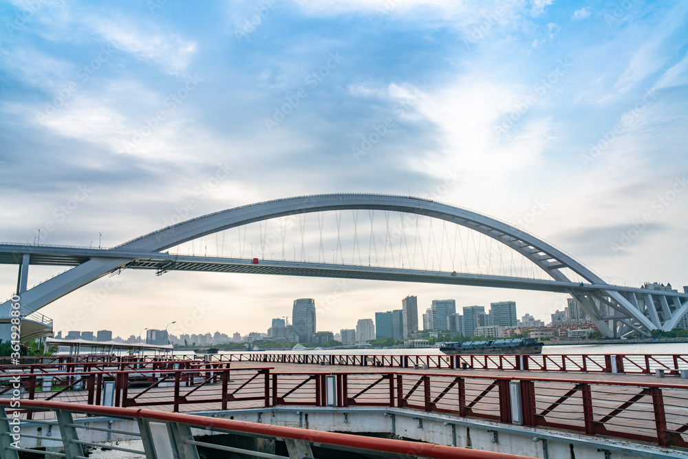 Fototapeta premium Panorama view of Lupu Bridge, on of the biggest bridge on Huangpu river, shot in Shanghai, China.
