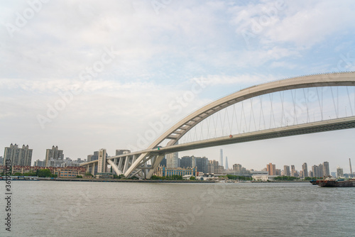 Lupu bridge across Huangpu river, in Shanghai, China. © Zimu