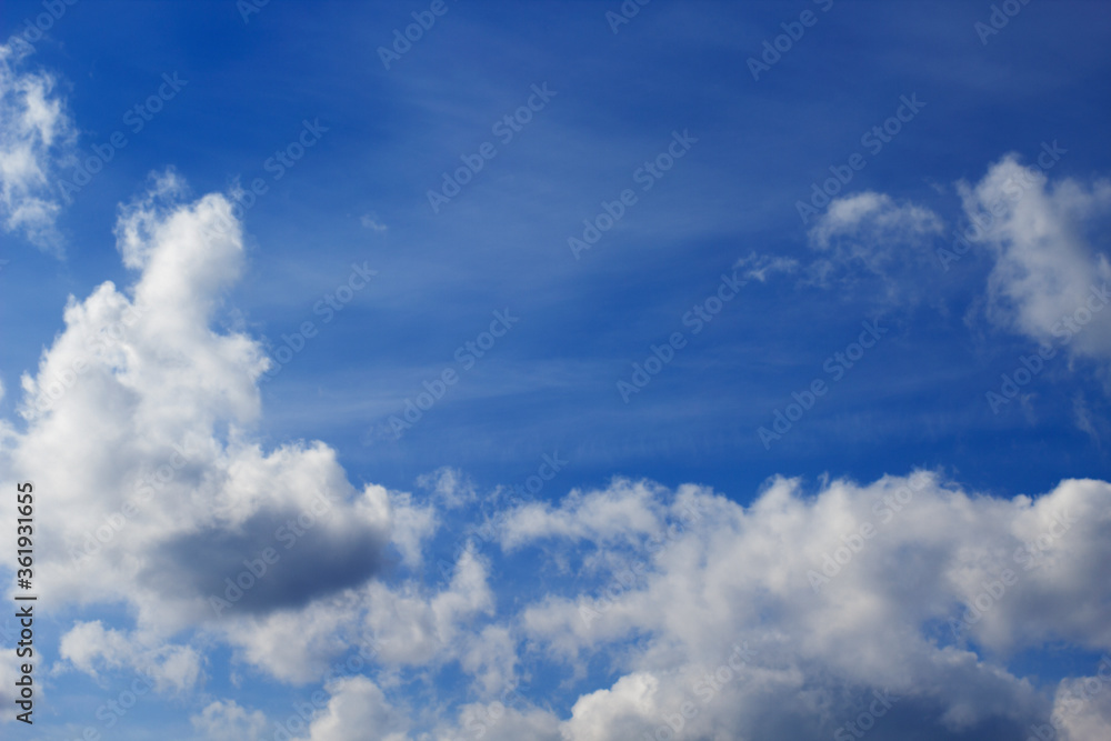 Air clouds in the blue sky. sky background Air clouds in the blue sky. sky background