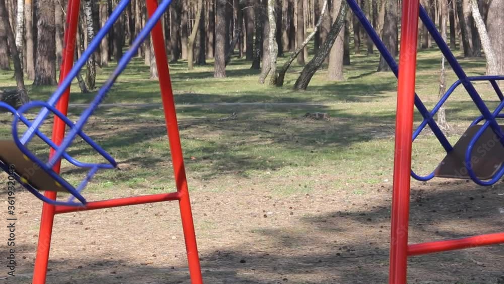 Swing in the playground. Recreation. Desolation. Emptiness Swing in the playground. Recreation. Desolation. Emptiness