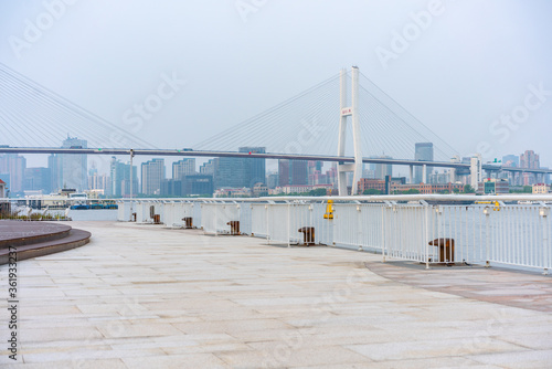The expo park along the Huangpu River,  with Nanpu bridge in the back, shot in Shanghai, China.