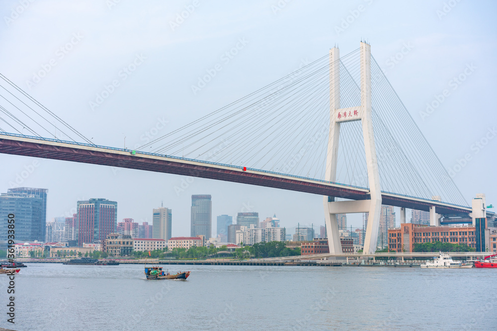 Nanpu Bridge, one of the biggest bridge over Huangpu River, in Shanghai, China. Nanpu Bridge, one of the biggest bridge over Huangpu River, in Shanghai, China.