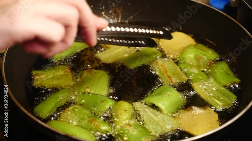 cooking wegetables in pan in oil photo