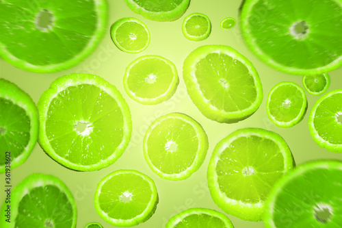 
Trendy summer pattern with ray of light made with lemon and lime slice on green background.Minimum summer concept.