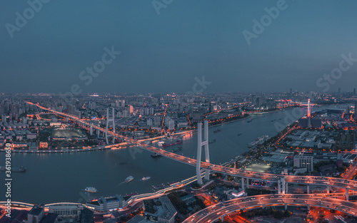 Aerial shot of Nanpu bridge in Shanghai, shot at sunset, in China. © Zimu