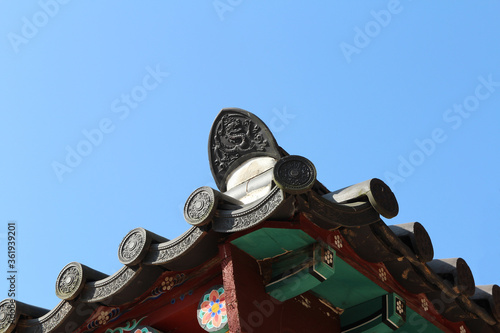 Traditional Korean ceramic roof tile with dragon image on Seokguram Grotto, Gyeong-ju, South Korea photo