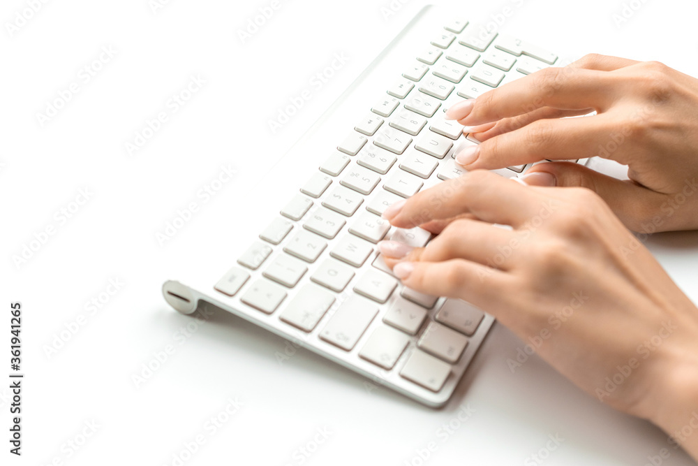 Hand typing. Hand typing on desktop office computer keyboard. Woman using laptop. Female online work female. Writing financial report, blog or email Hand typing. Hand typing on desktop office computer keyboard. Woman using laptop. Female online work female. Writing financial report, blog or email