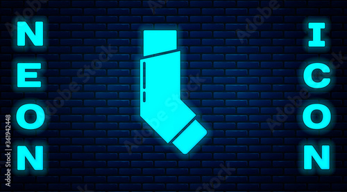 Glowing neon Inhaler icon isolated on brick wall background. Breather for cough relief, inhalation, allergic patient. Vector Illustration.