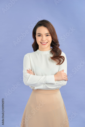 Cuadro en lienzo Portrait of successful business asian women with arms crossed and smile isolated