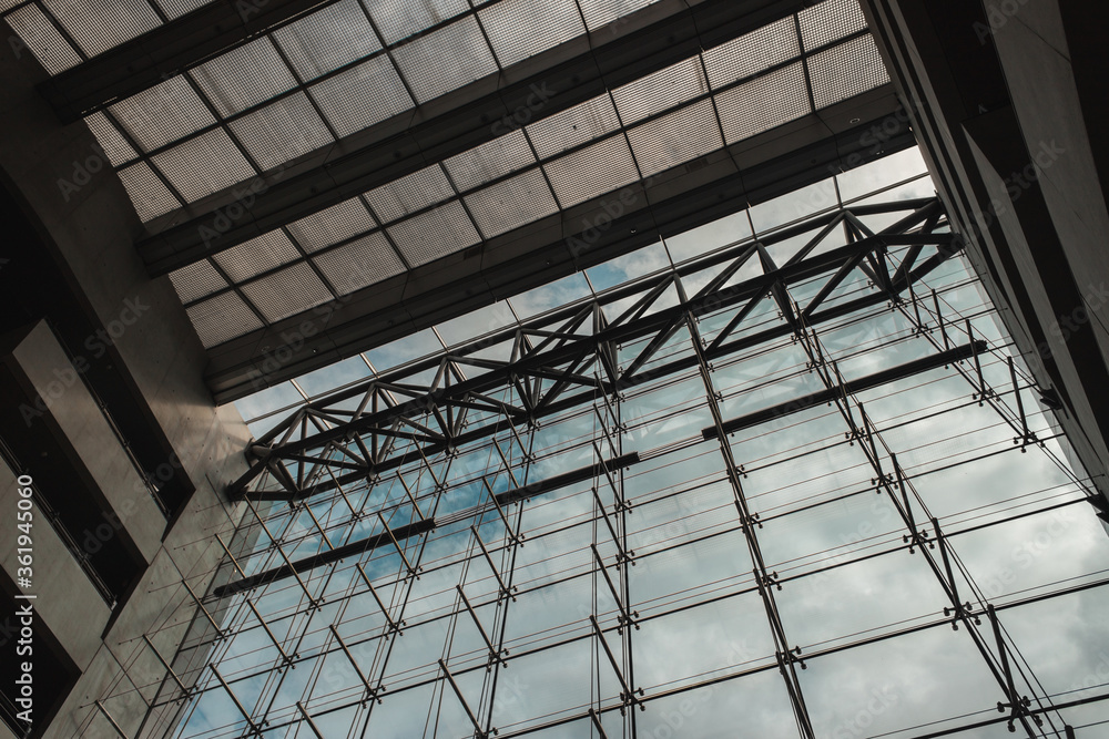 COPENHAGEN, DENMARK - APRIL 30, 2020: Bottom view of glass facade and roof of Black Diamond Royal Library, Copenhagen, Denmark COPENHAGEN, DENMARK - APRIL 30, 2020: Bottom view of glass facade and roof of Black Diamond Royal Library, Copenhagen, Denmark