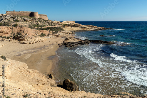 San Ramón castle ruins at El Playazo beach, Cabo de Gata-Níjar Natural Park, Almería province, Andalusia, Spain