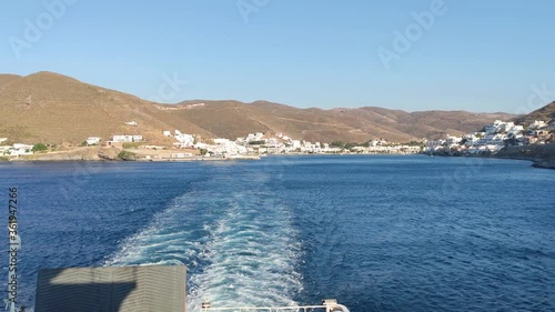 Ship departing from Merichas port, Kythnos island, Greece. photo
