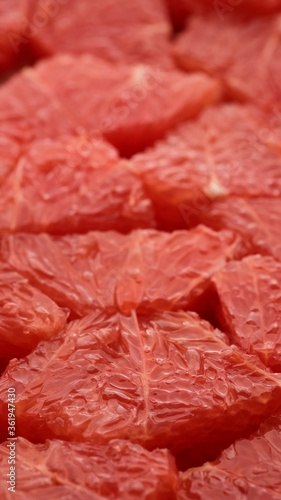 sliced fresh red grapefruit closeup