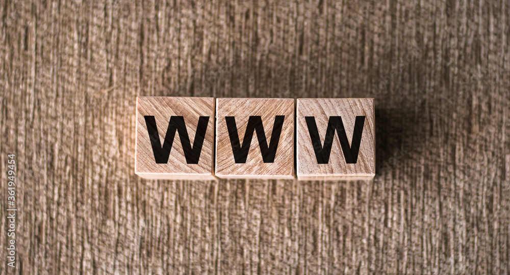 WWW website url address three word on wooden cube block, minimal background concept for internet connection, copy space WWW website url address three word on wooden cube block, minimal background concept for internet connection, copy space