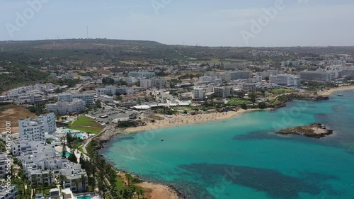 Wallpaper Mural aerial view of a beach with some motorboats and some people swimming in the turquoise sea. Torontodigital.ca