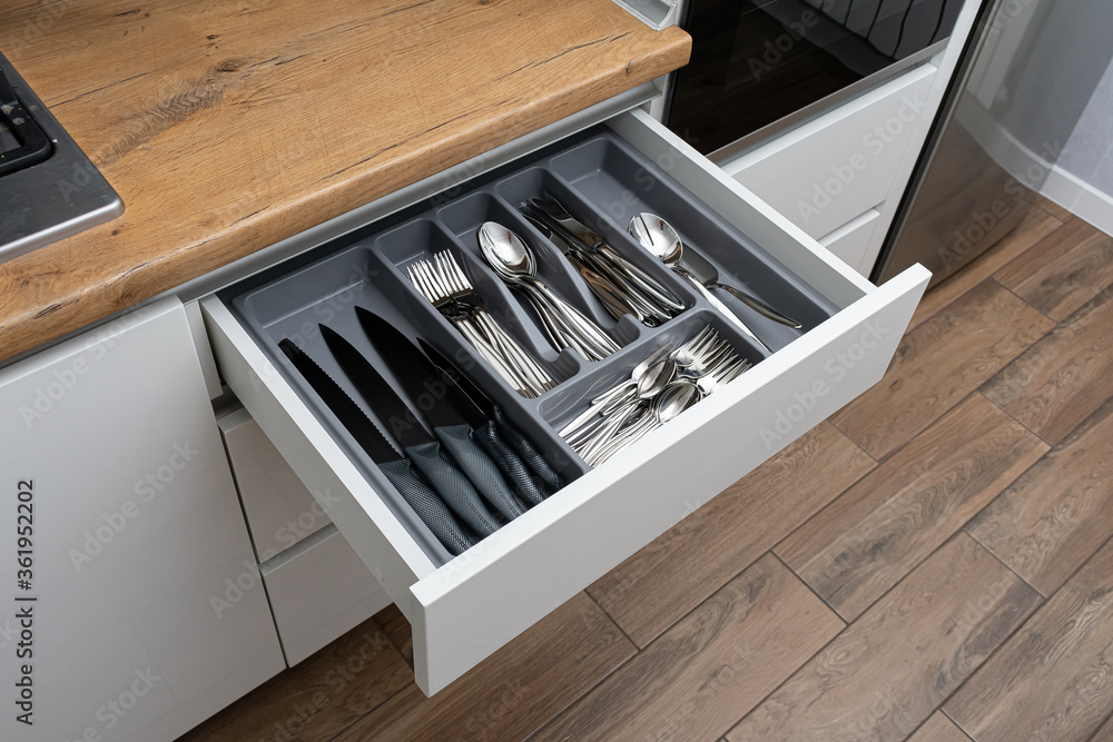 Kitchen drawer with cutlery set - obrazy, fototapety, plakaty 