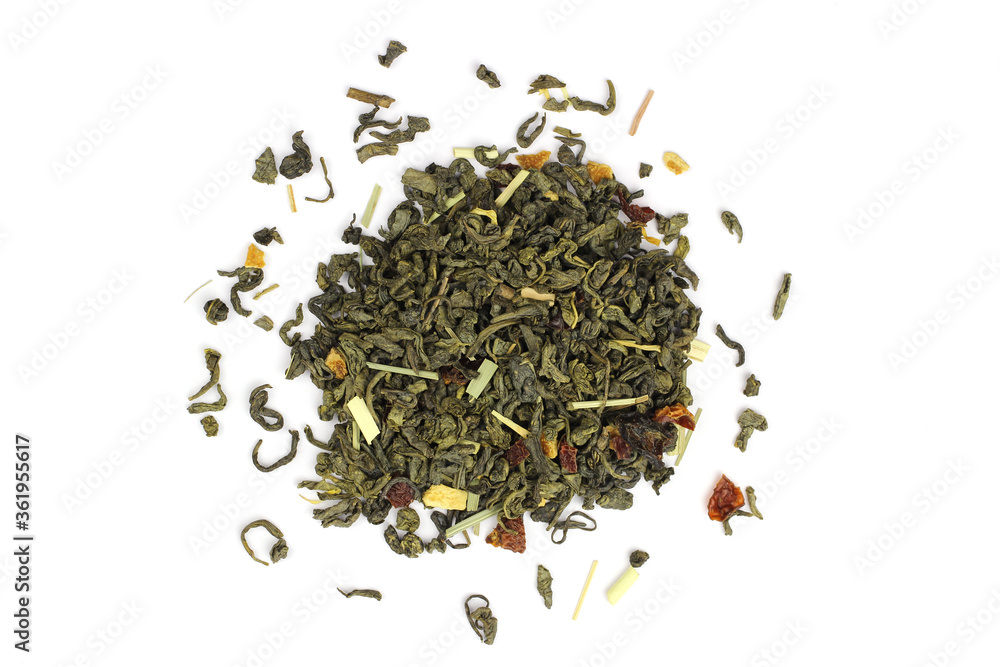 green tea loose leaf with fruit slices isolated on white green tea loose leaf with fruit slices isolated on white