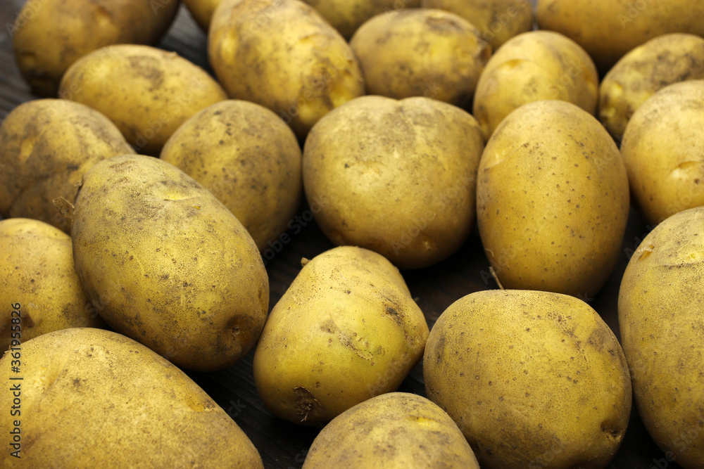 Raw organic potatoes, background, texture Raw organic potatoes, background, texture