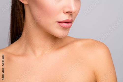 Closeup cropped profile photo of attractive lady nude shoulders plump perfect shape lips after injecting enhancement fillers ideal contour cheek line isolated grey color background photo