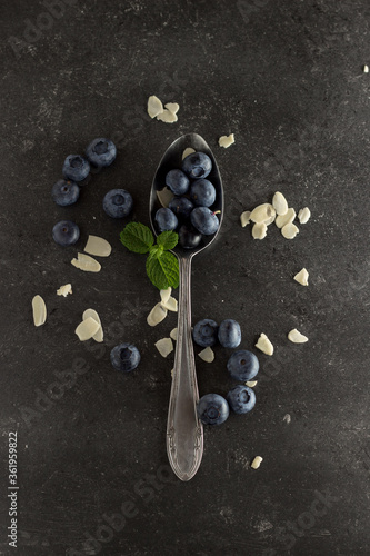 mystic light blueberries on dark background