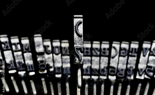 Photography Macro closeup of isolated type bars of old typewriter with letters and symbols,