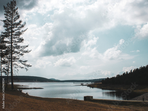 lake in the mountains under the sky