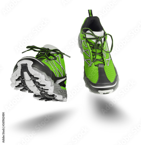 Fototapeta Naklejka Na Ścianę i Meble -  Green sport shoes running isolated on white