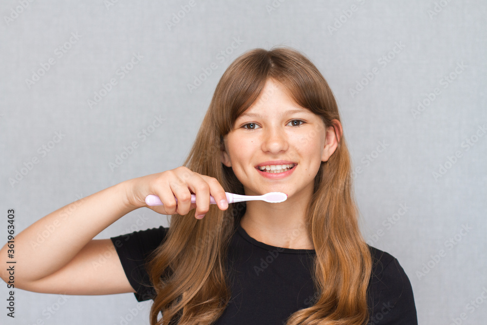 Happy little girl brushing her teeth. Healthy teeth concept. Happy little girl brushing her teeth. Healthy teeth concept.
