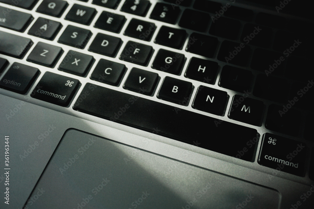 Close up of a laptop's keyboard with selective focus. Close up of a laptop's keyboard with selective focus.