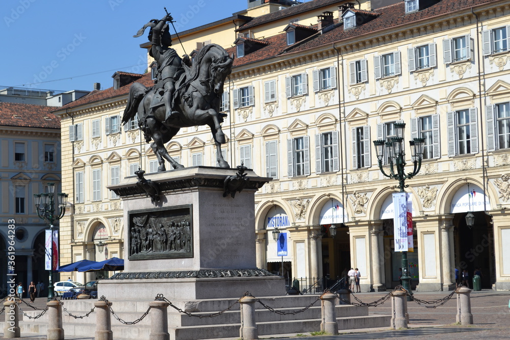 TURIN, ITALY – AUGUST 13, 2013: The equestrian statue of Emmanuel Philibert at the center of the San Carlo Square in Turin, Italy on August 13, 2013