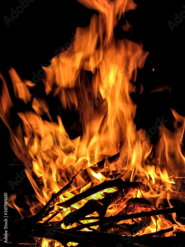 bonfire on Ivan Kupala. bonfire with branches at night in the forest. tongues of fire. flames of fire. night fire 