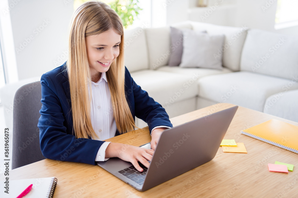 Photo of little pretty blond pupil school girl diligent student notebook online lesson web camera call sit distance quarantine study september home room house classroom indoors Photo of little pretty blond pupil school girl diligent student notebook online lesson web camera call sit distance quarantine study september home room house classroom indoors