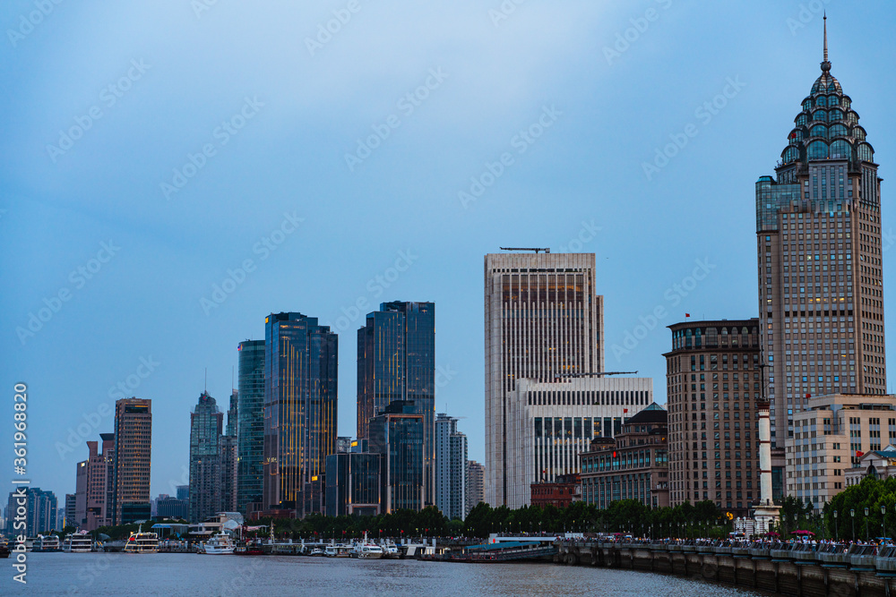 The modern skyscrapers in Lujiazui, along the Huangpu River, in Shanghai, China. The modern skyscrapers in Lujiazui, along the Huangpu River, in Shanghai, China.