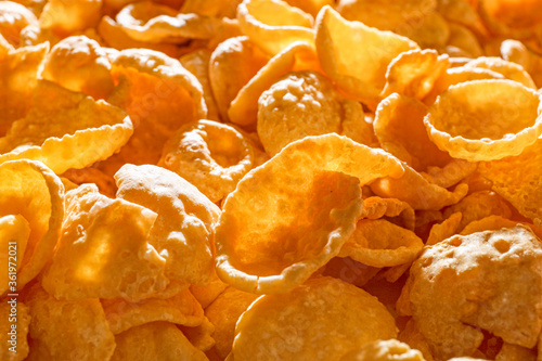 Corn flakes texture background. Close up