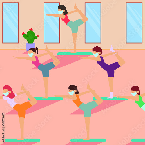 Womans are keeping their distance while doing yoga in yoga class