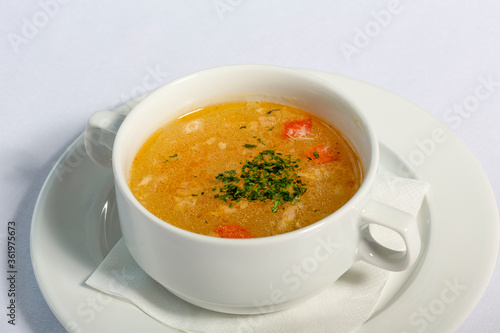 Vegetable soup served in white bowl