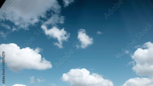 Time lapse of a blue sky with white clouds