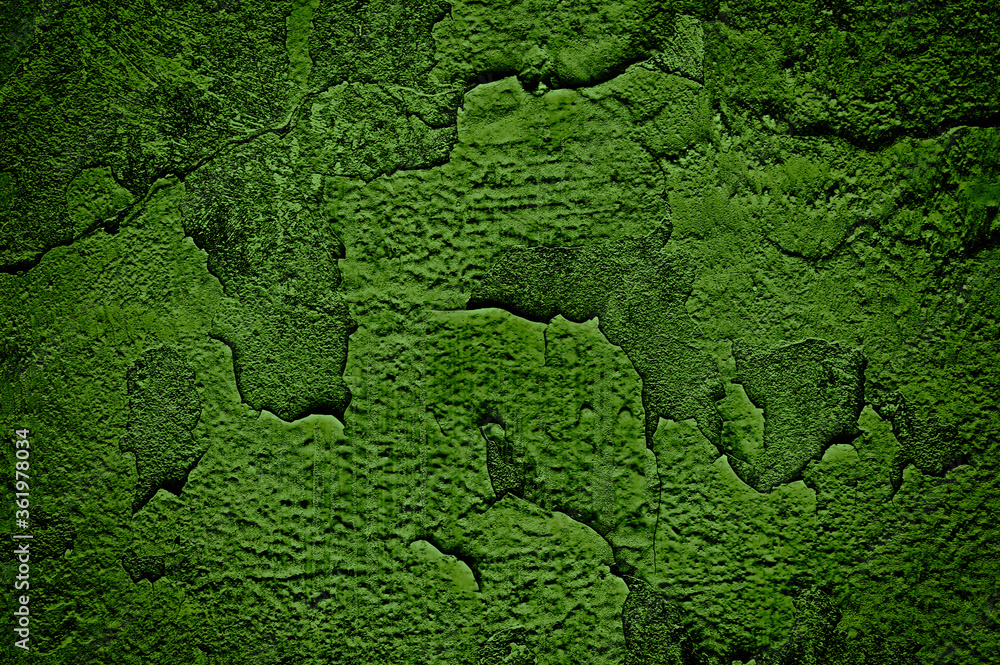 Saturated green texture of an old wall. Abstract dark green wall background. Saturated green texture of an old wall. Abstract dark green wall background.