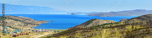 Beautiful views of tourist center in village of Kurkut and Small Sea - Maloe More Bay of lake Baikal in summer day