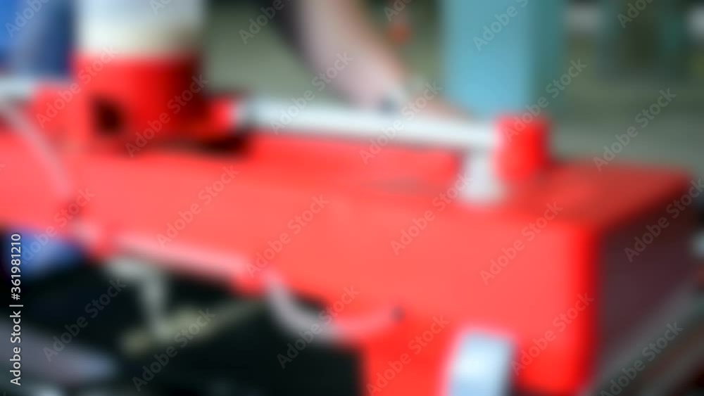 Blurred background. 3d printer for liquid test. 3D printer printing pancakes Blurred background. 3d printer for liquid test. 3D printer printing pancakes