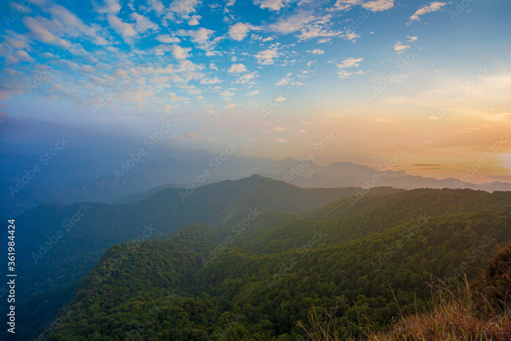 Mountain valley during sunrise. Natural summer landscape Mountain valley during sunrise. Natural summer landscape
