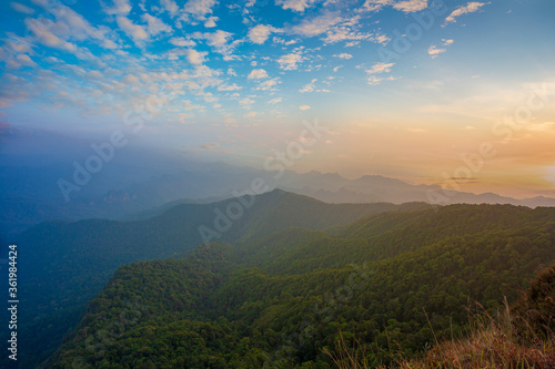 Mountain valley during sunrise. Natural summer landscape © banjongseal324