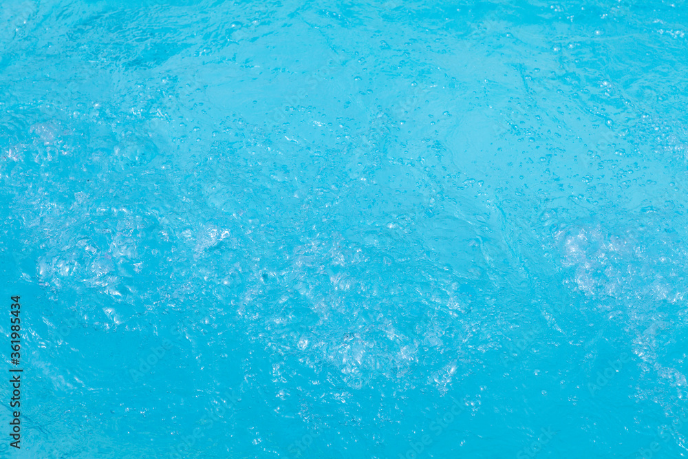 Sparkling swimming pool water in closeup