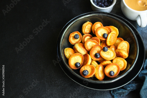 mini pancakes cereal delicious dessert breakfast Menu concept serving size. food background top view copy space for text organic healthy eating
