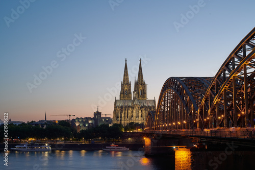 Cologne Skyline with Cologne Cathedral and Hohenzollern Bridge at after sunset