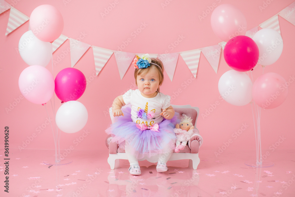 Sweet funny baby in hat with flowers. Easter greeting card, copyspace for your text. Poster for Easter holiday. Congratulations on Mother's Day. Cute baby girl. Children Protection Day. 