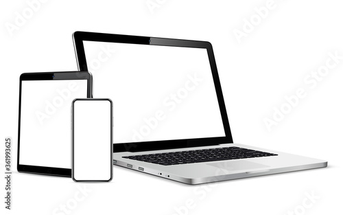 Gadgets including smartphone, digital tablet and laptop, blank screen with copyspace
