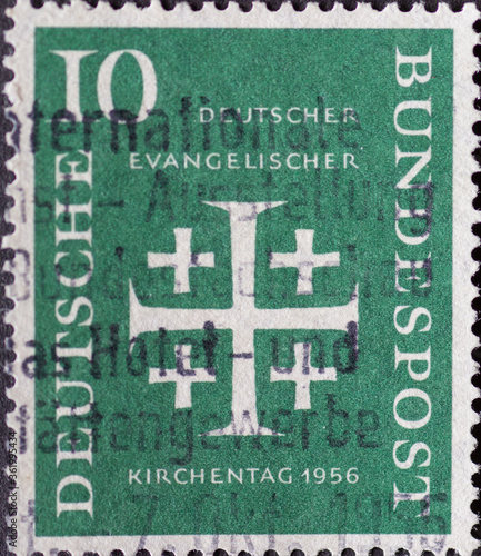 GERMANY - CIRCA 1956: This postage stamp in green shows the Jerusalem Cross, the symbol of the German Evangelical Church Day 1956 photo