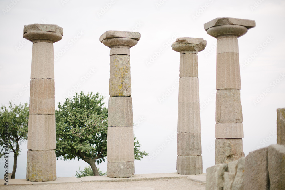 Temple of Athena. Coupons made of stone. The columns of the temple. Historical temple and ruins. Temple of Athena. Coupons made of stone. The columns of the temple. Historical temple and ruins.