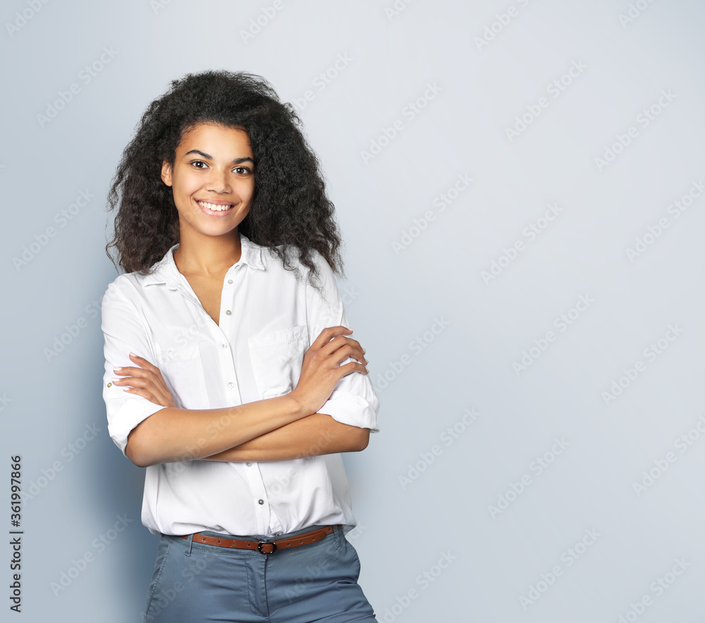 Portrait of a beautiful african woman on gray background Portrait of a beautiful african woman on gray background